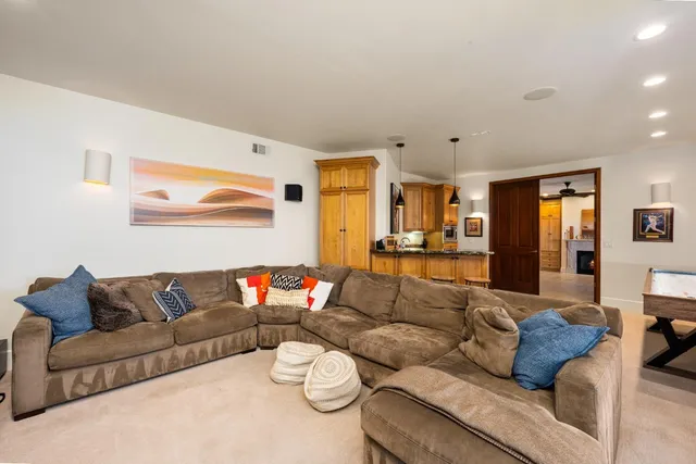 a view of a living room and balcony
