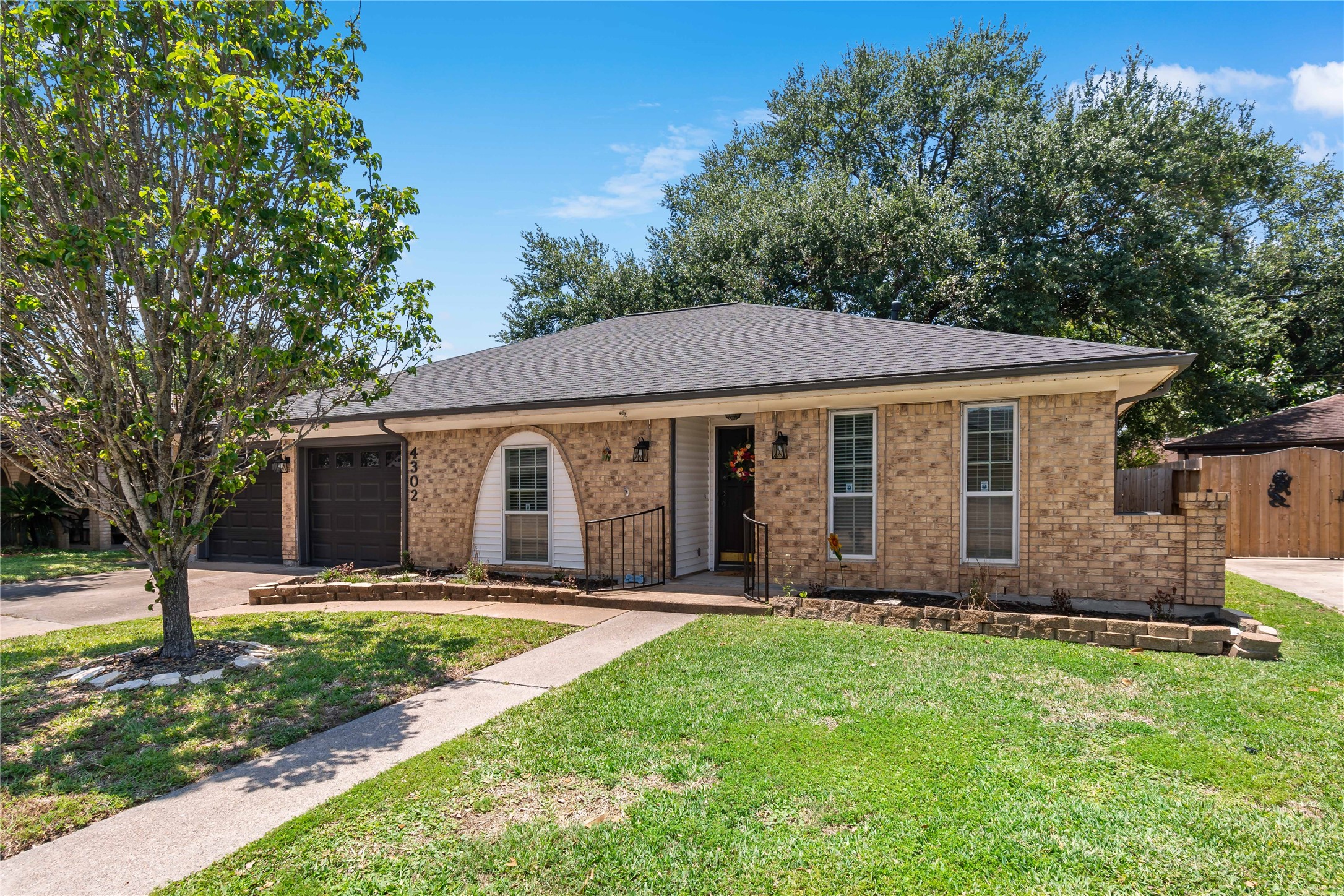 4302 Seneca Street Pasadena, TX 77504 - Photo 19 of 19 a front view of house with yard and green space