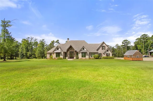 a view of a lake with a big yard