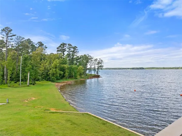 a view of a lake with outdoor space