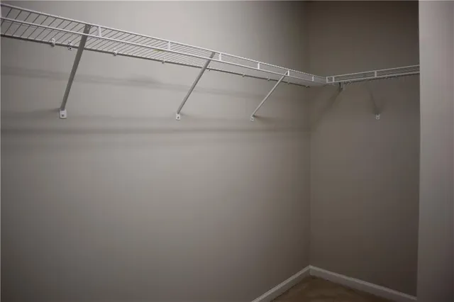 a view of a room with racks on the wall