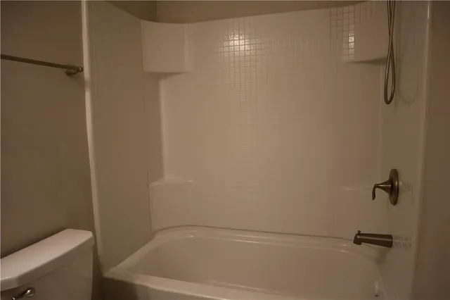 a bathroom with a bath tub