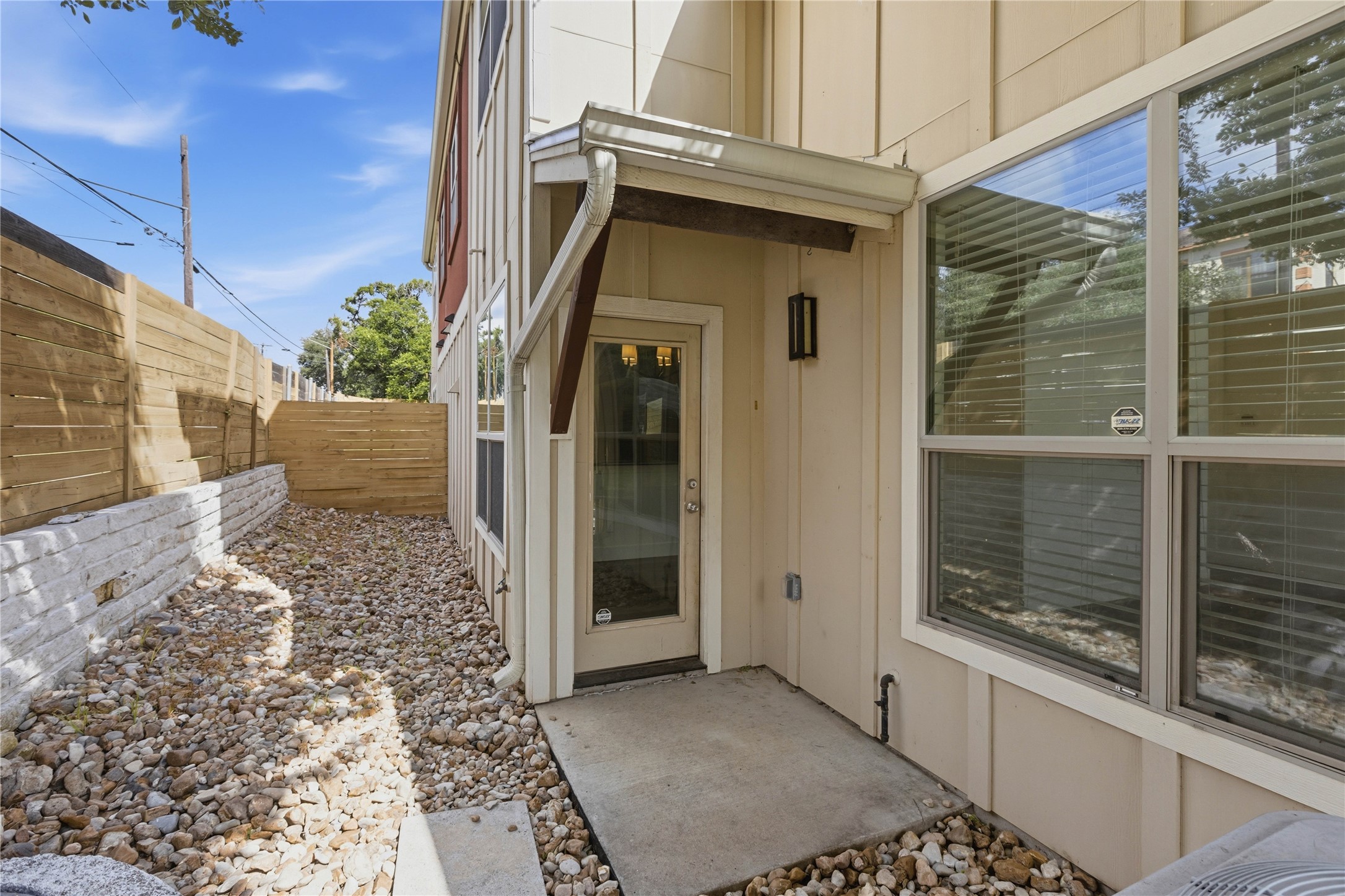 4124 Valley View Road, Unit 4A & 4B Austin, TX 78704 - Photo 31 of 40 A private, rock-filled side yard features a newly installed wooden fence for ultimate seclusion.