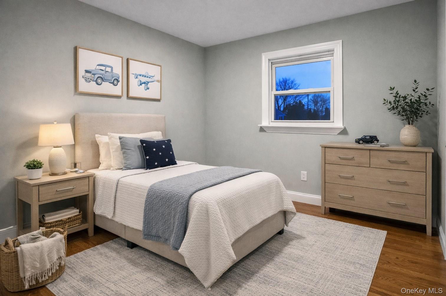 45 Colony Lane Syosset, NY 11791 - Photo 14 of 23 a bedroom with a bed and a lamp on dresser