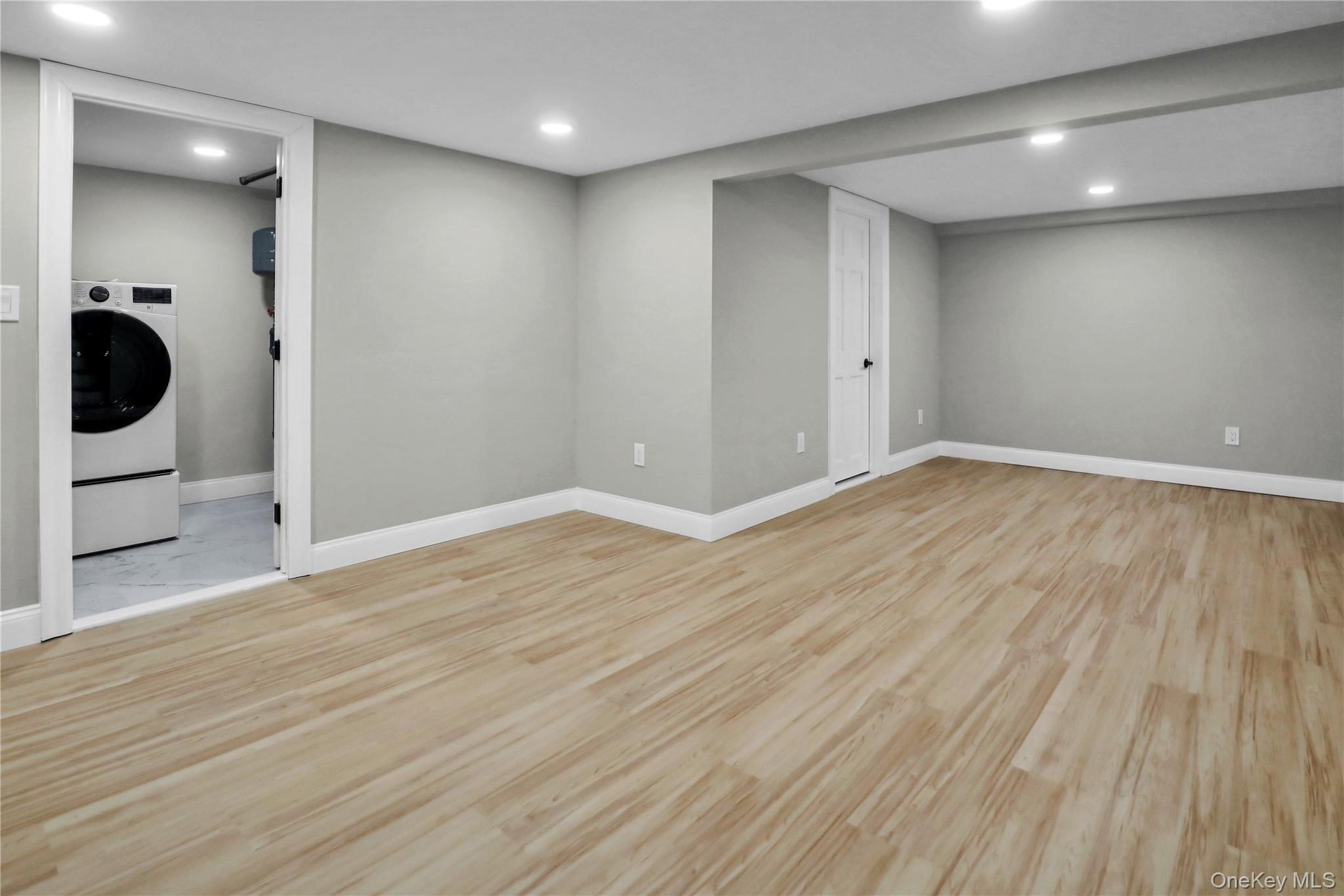 45 Colony Lane Syosset, NY 11791 - Photo 18 of 23 a view of a livingroom with wooden floor