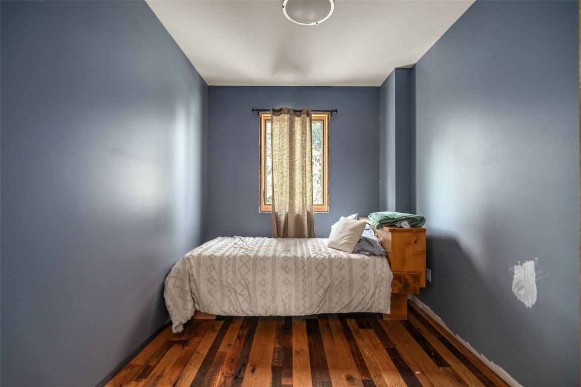 29195 River Drive Clark, CO 80428 - Photo 13 of 36 a bed sitting in a bedroom next to a window