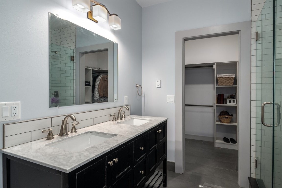 29195 River Drive Clark, CO 80428 - Photo 17 of 36 a bathroom with a sink vanity and a mirror
