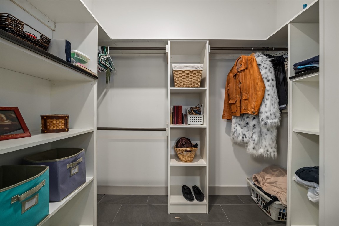 29195 River Drive Clark, CO 80428 - Photo 18 of 36 a view of walk in closet with clothes and shoes