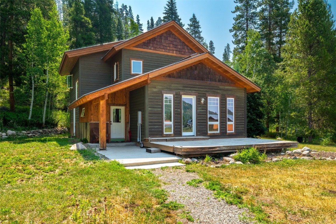 29195 River Drive Clark, CO 80428 - Photo 2 of 36 a front view of a house with a yard
