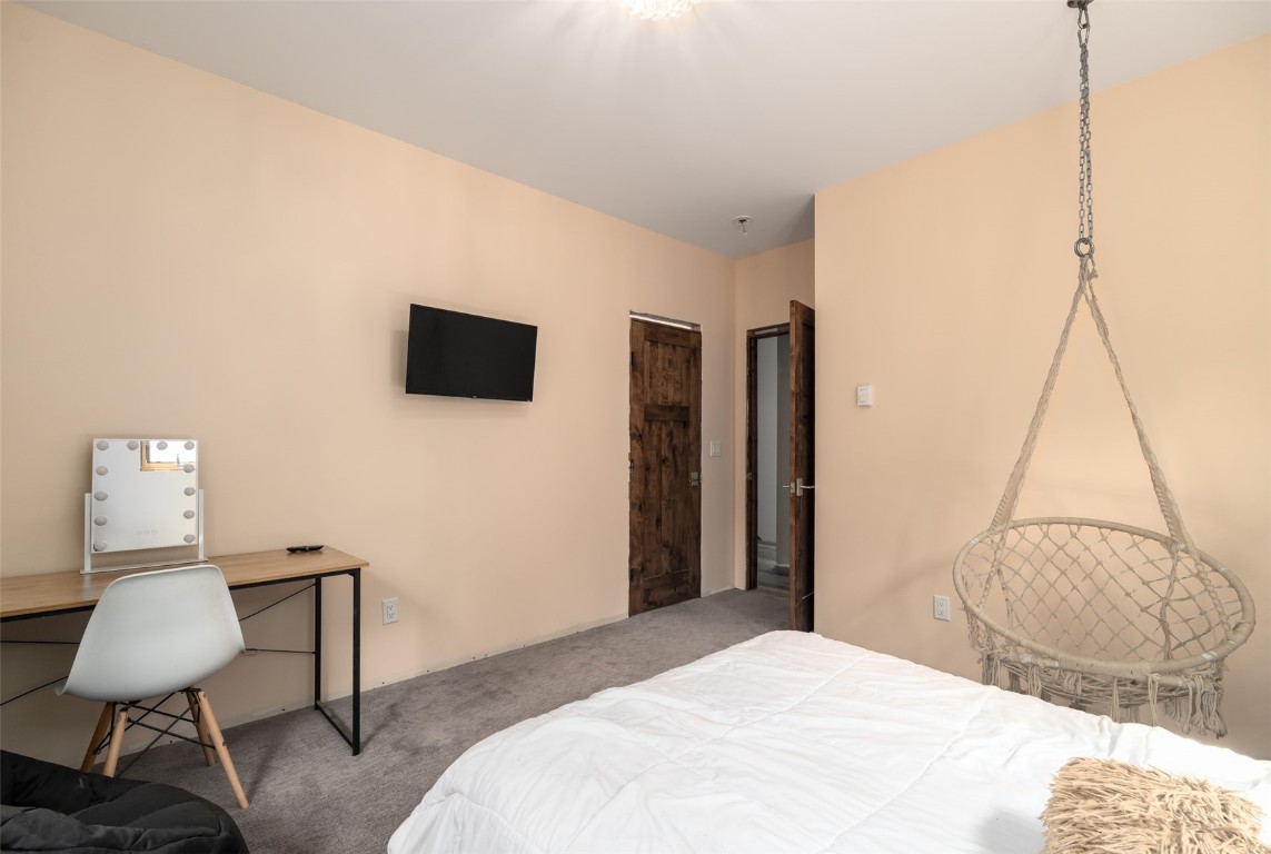 29195 River Drive Clark, CO 80428 - Photo 23 of 36 a bedroom with a bed and a chair