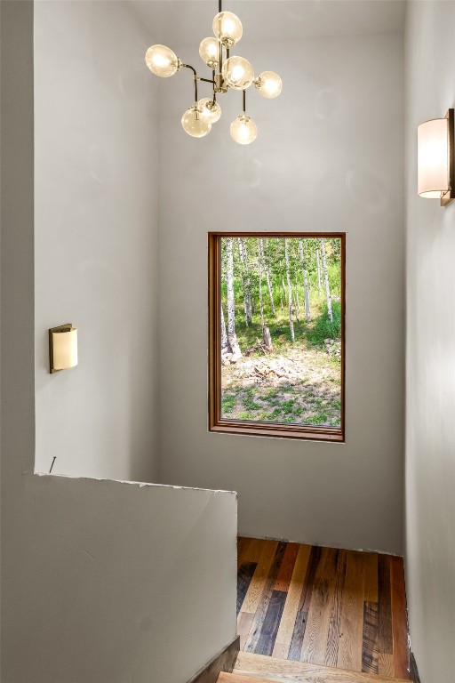 29195 River Drive Clark, CO 80428 - Photo 24 of 36 a view of a room with window ceiling fan and wooden floor