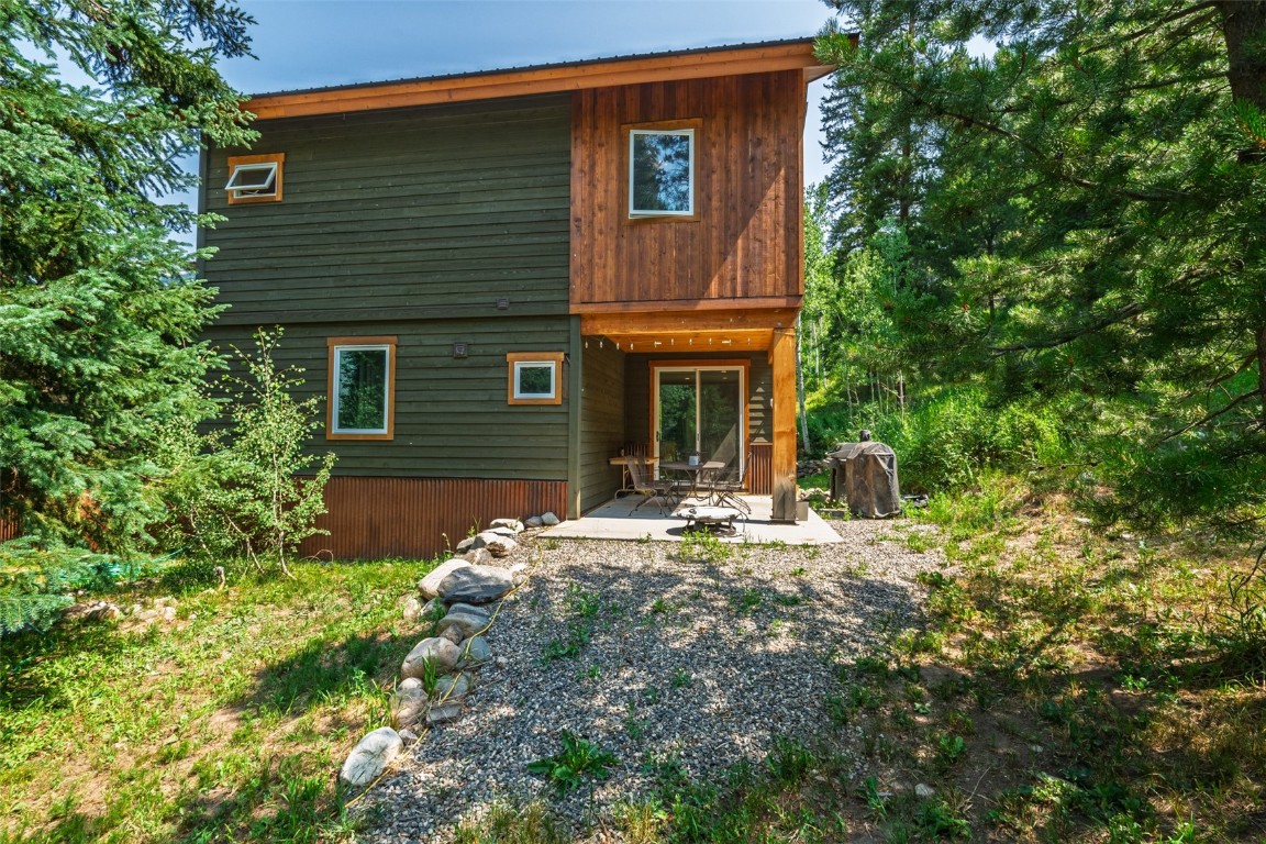 29195 River Drive Clark, CO 80428 - Photo 27 of 36 a front view of a house with garden