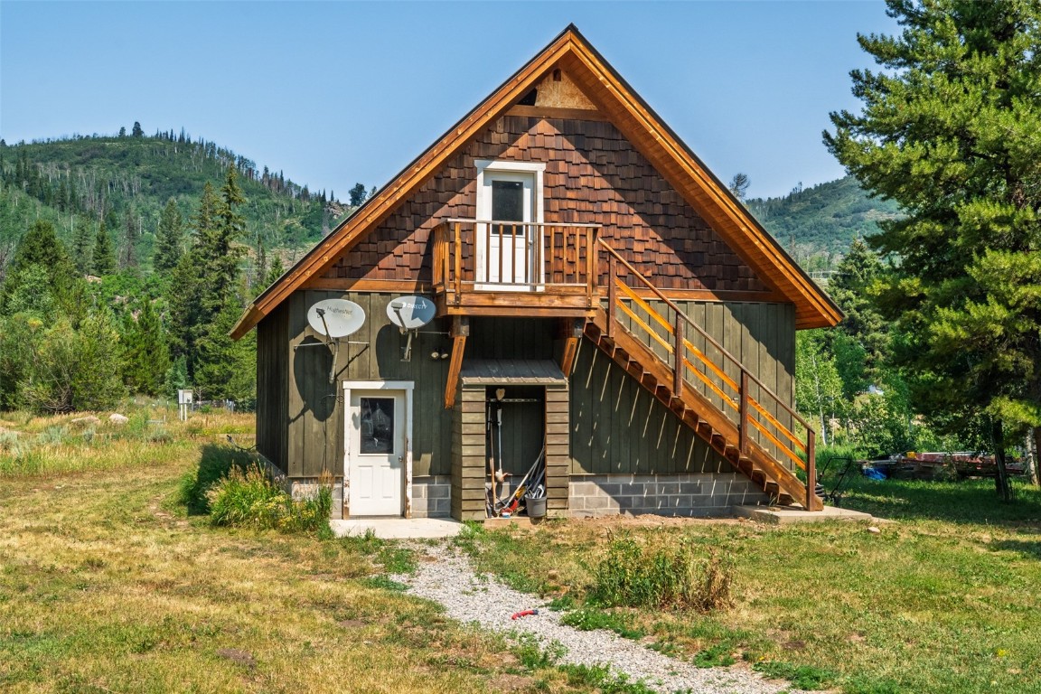 29195 River Drive Clark, CO 80428 - Photo 30 of 36 a front view of a house with a yard