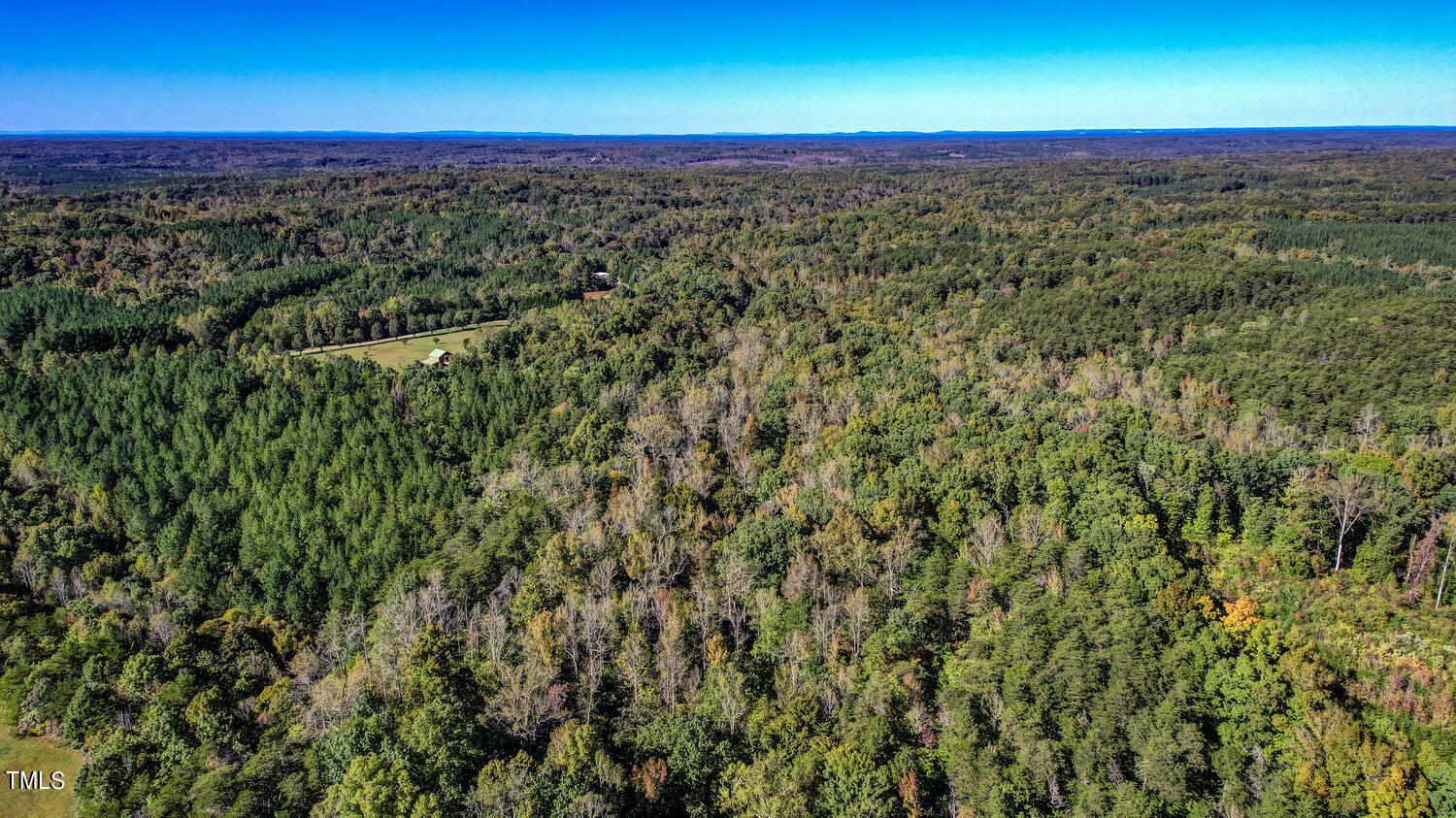 0 Cherry Grove Road Yanceyville, NC 27379 - Photo 7 of 9 an aerial view of residential houses with outdoor space and trees