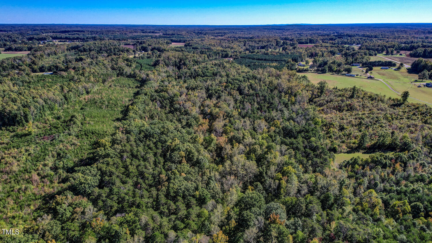 0 Cherry Grove Road Yanceyville, NC 27379 - Photo 9 of 9 a view of a city with lush green forest