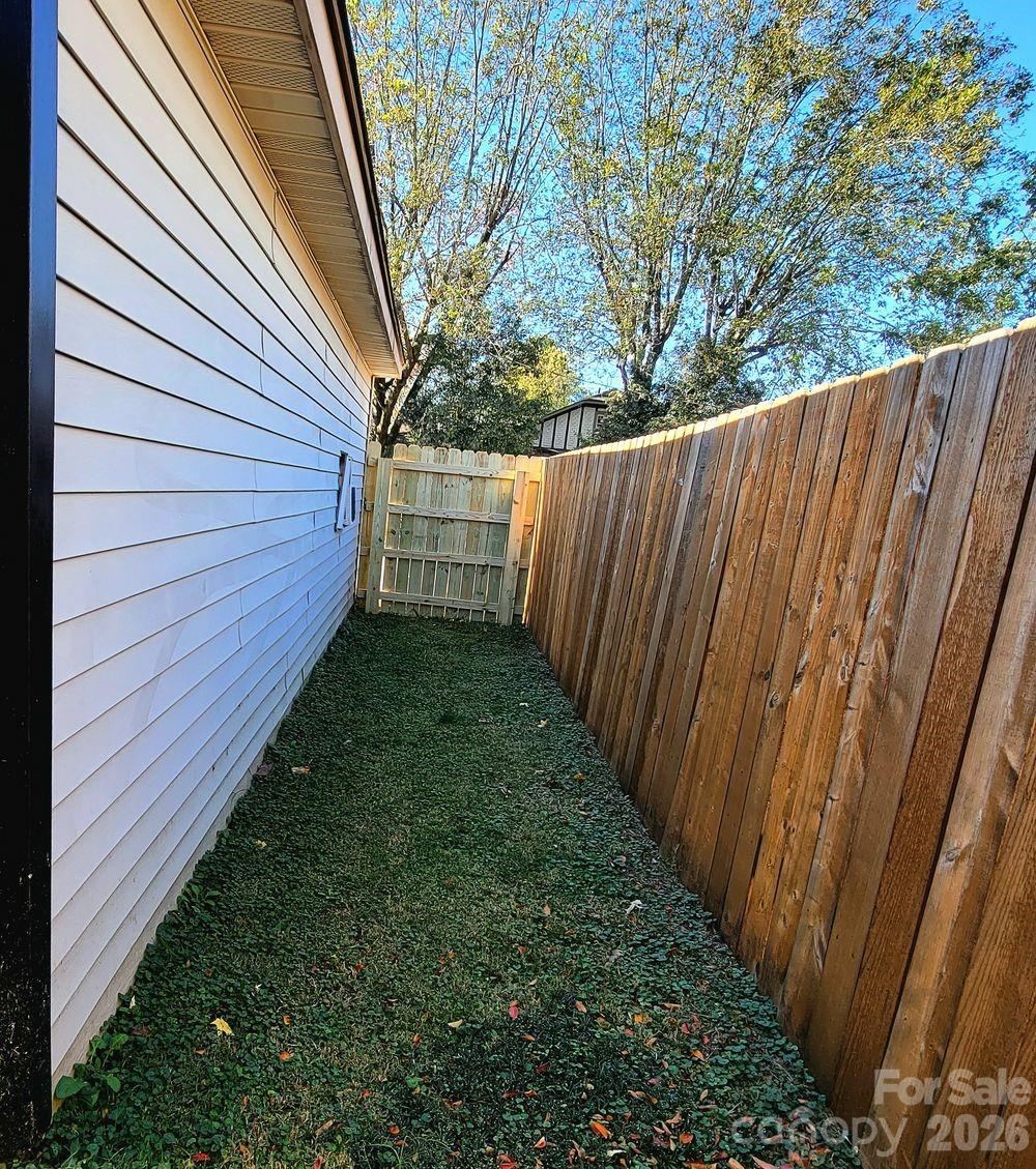 109 Ridge Avenue Salisbury, NC 28144 - Photo 4 of 20 a view of a backyard with pathway