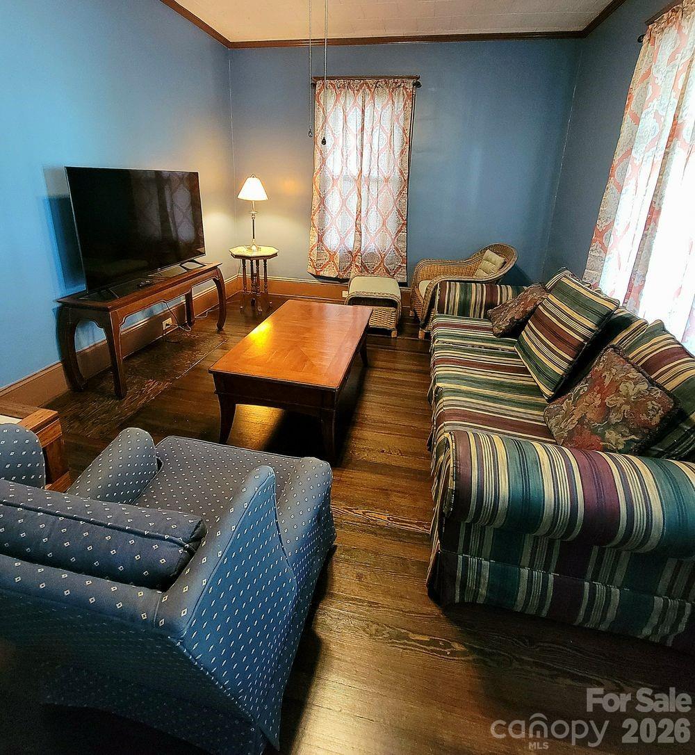 109 Ridge Avenue Salisbury, NC 28144 - Photo 9 of 20 a living room with furniture and a flat screen tv