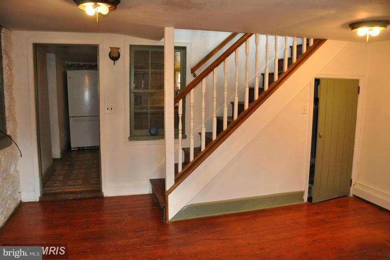 7431 Green Valley Road Frederick, MD 21701 - Photo 11 of 30 Dining Room with Entry to Second Floor