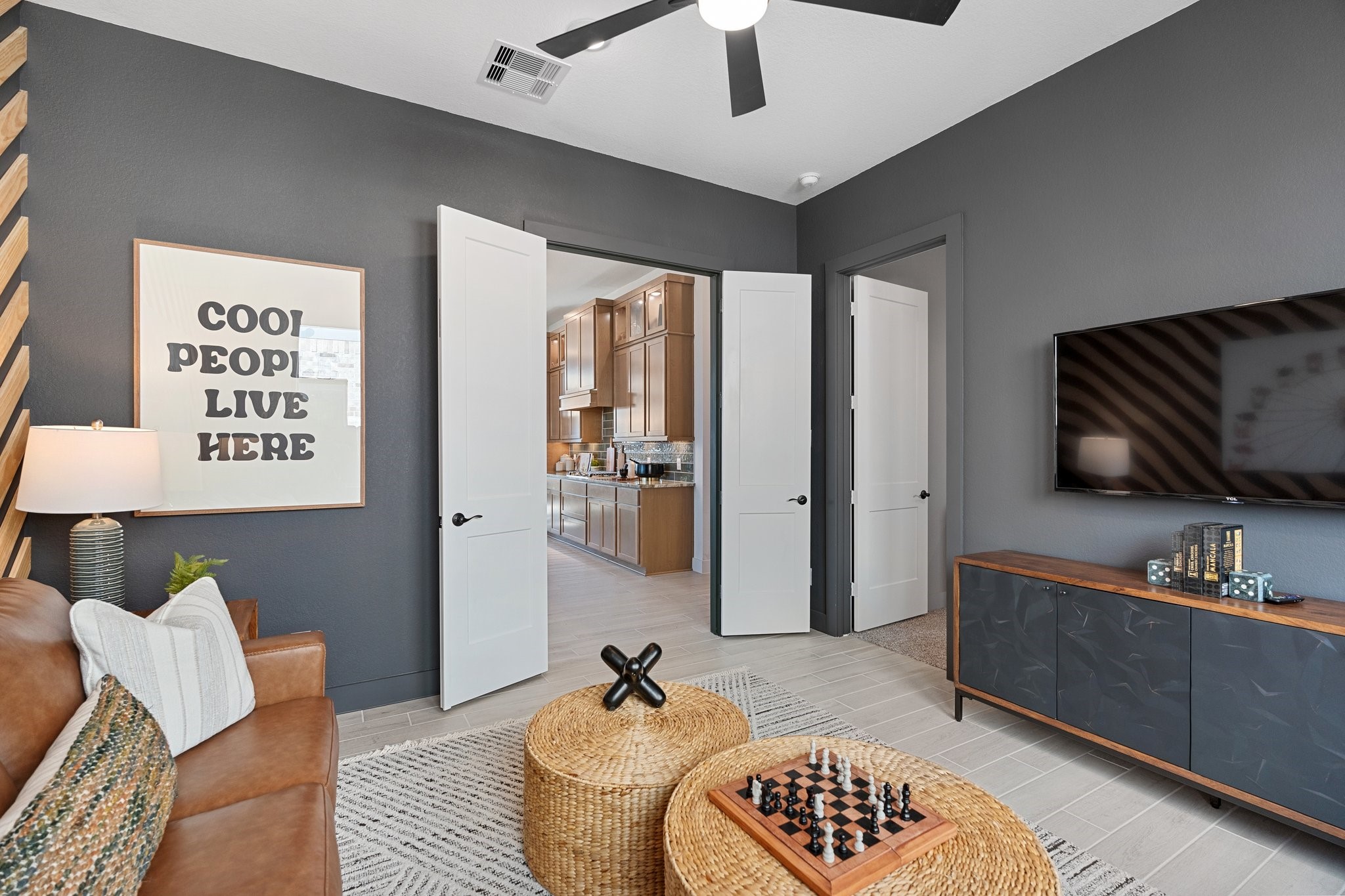 327 Afton Drive Rosenberg, TX 77471 - Photo 21 of 48 a living room with furniture and a flat screen tv