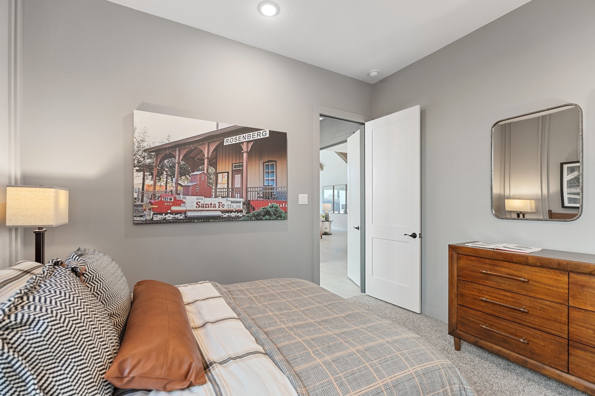 327 Afton Drive Rosenberg, TX 77471 - Photo 23 of 48 a bedroom with a bed and a dresser