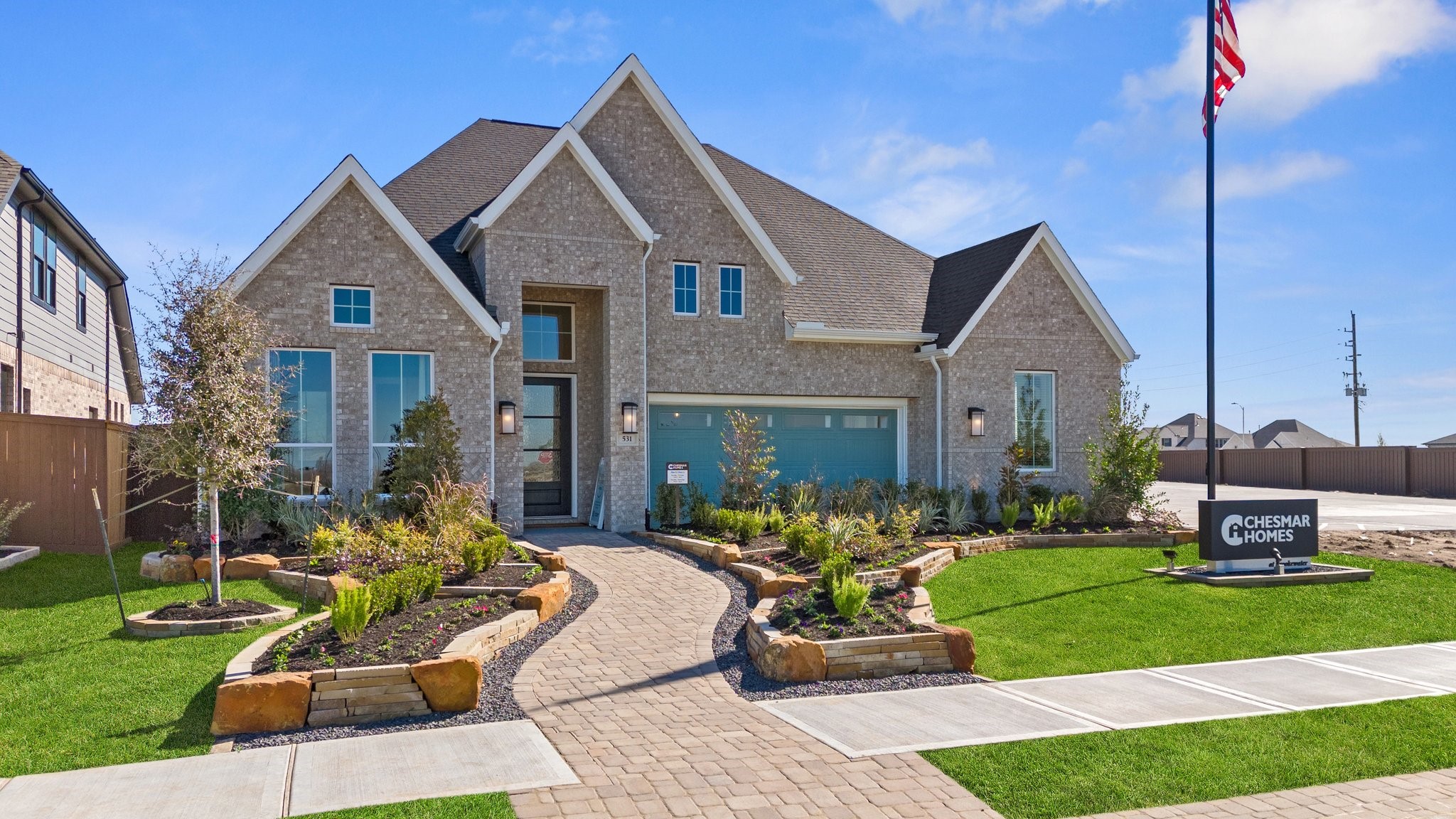 327 Afton Drive Rosenberg, TX 77471 - Photo 12 of 48 a front view of a house with a yard table and chairs