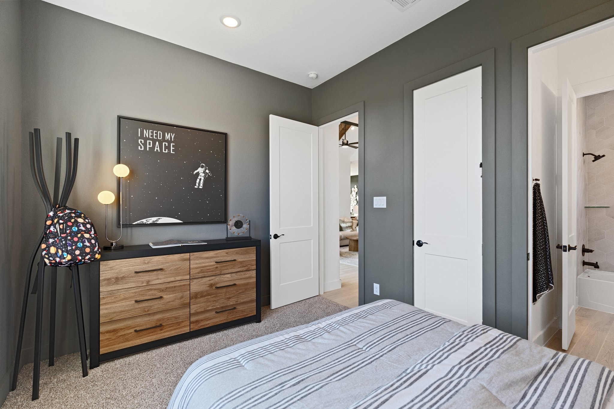 327 Afton Drive Rosenberg, TX 77471 - Photo 36 of 48 a bedroom with a bed and a dresser