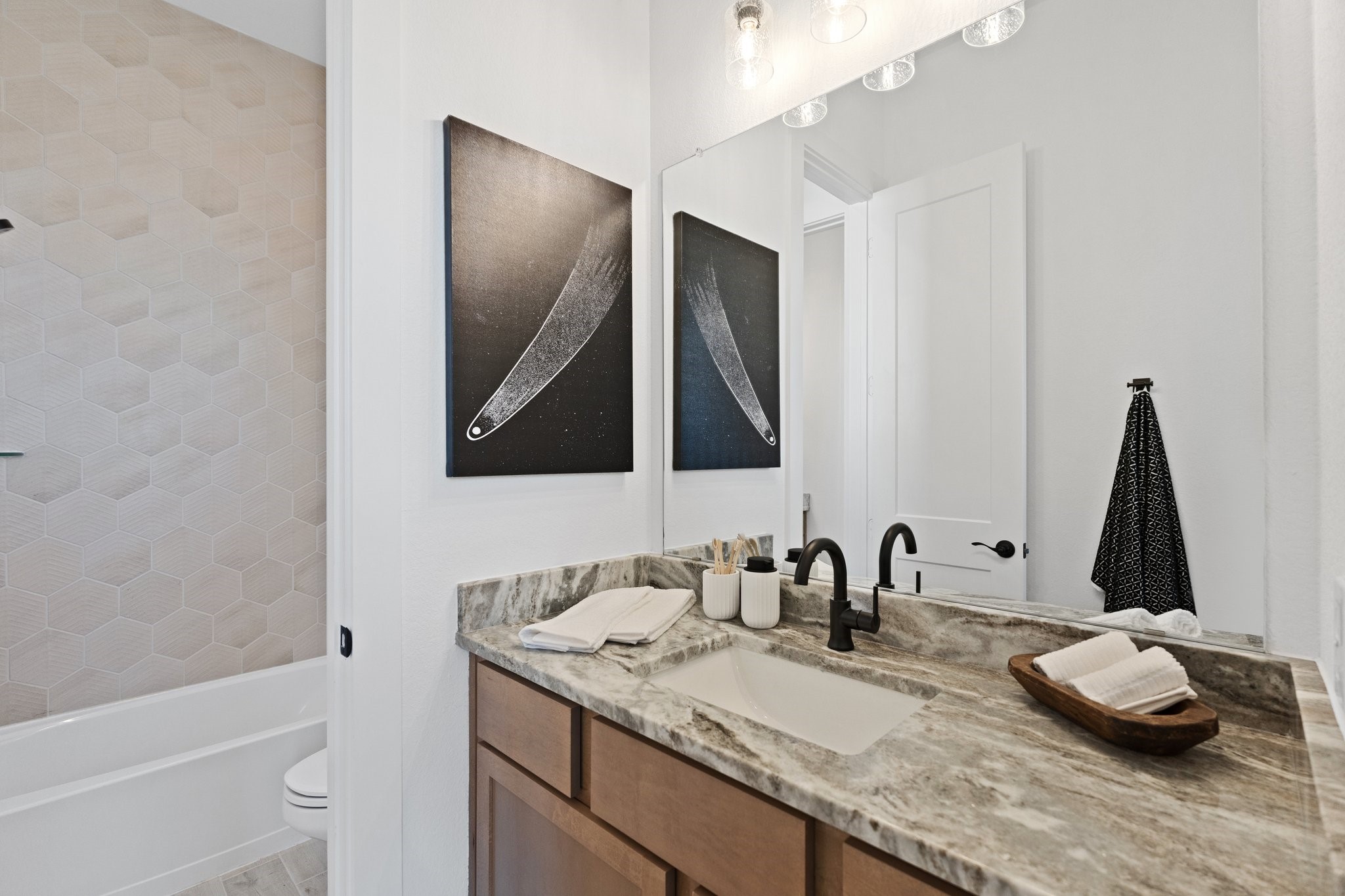 327 Afton Drive Rosenberg, TX 77471 - Photo 37 of 48 a bathroom with a granite countertop sink and a mirror