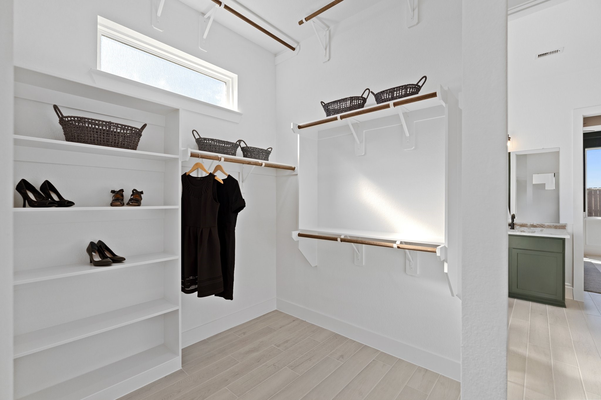 327 Afton Drive Rosenberg, TX 77471 - Photo 42 of 48 a view of walk in closet with clothes and shoes