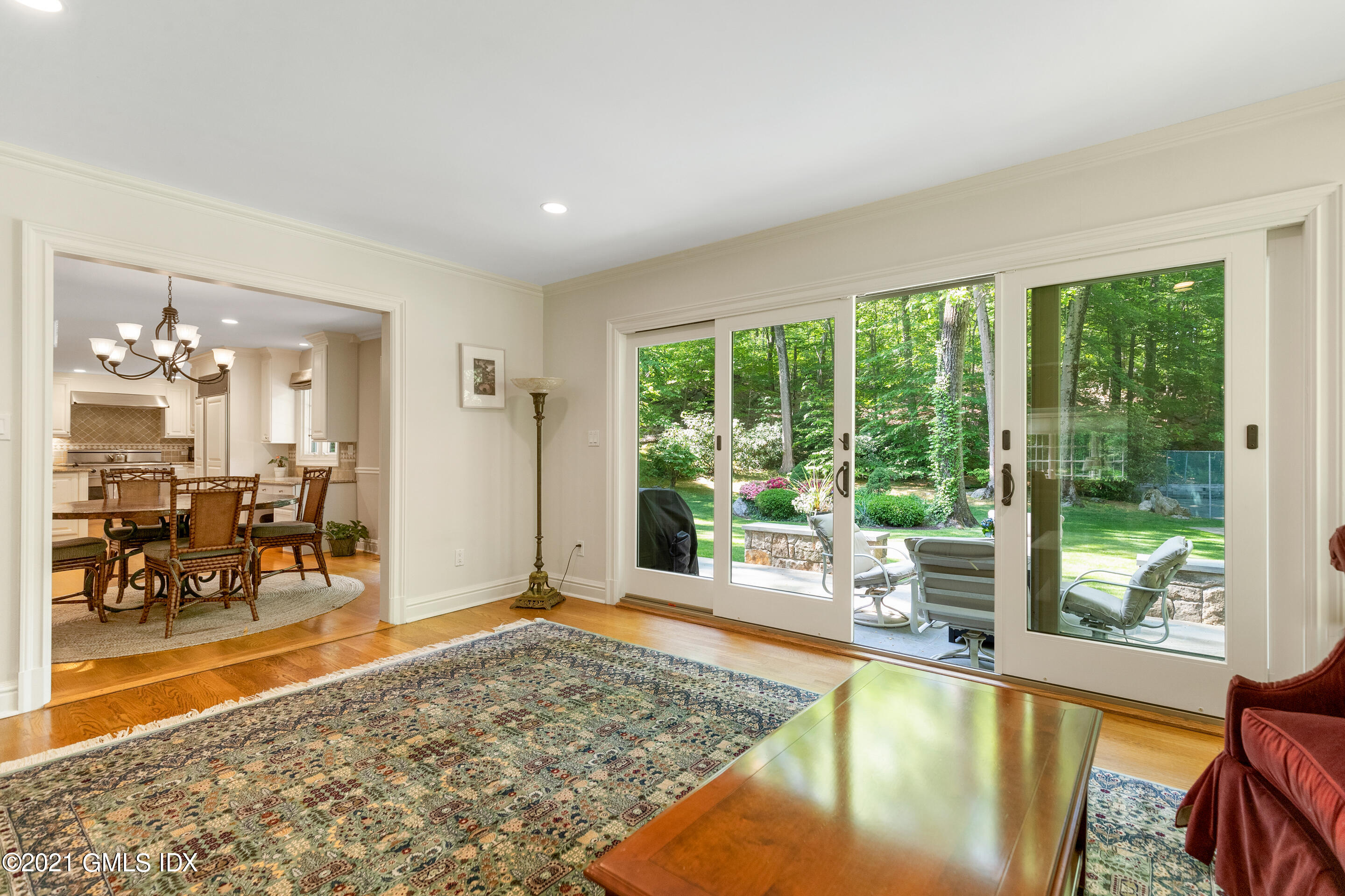 10 Hycliff Road Greenwich, CT 06831 - Photo 8 of 33 a living room with hardwood floor and a large window