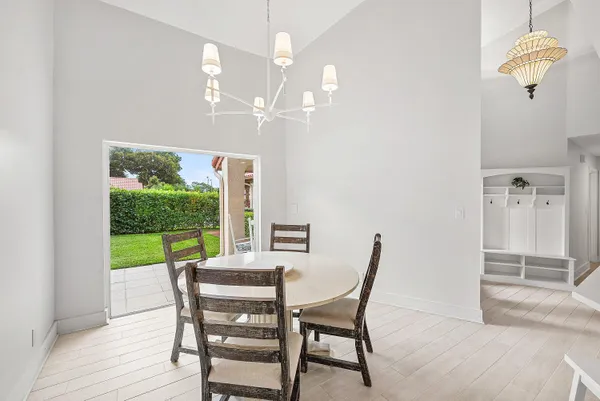 a view of a hallway with seating area