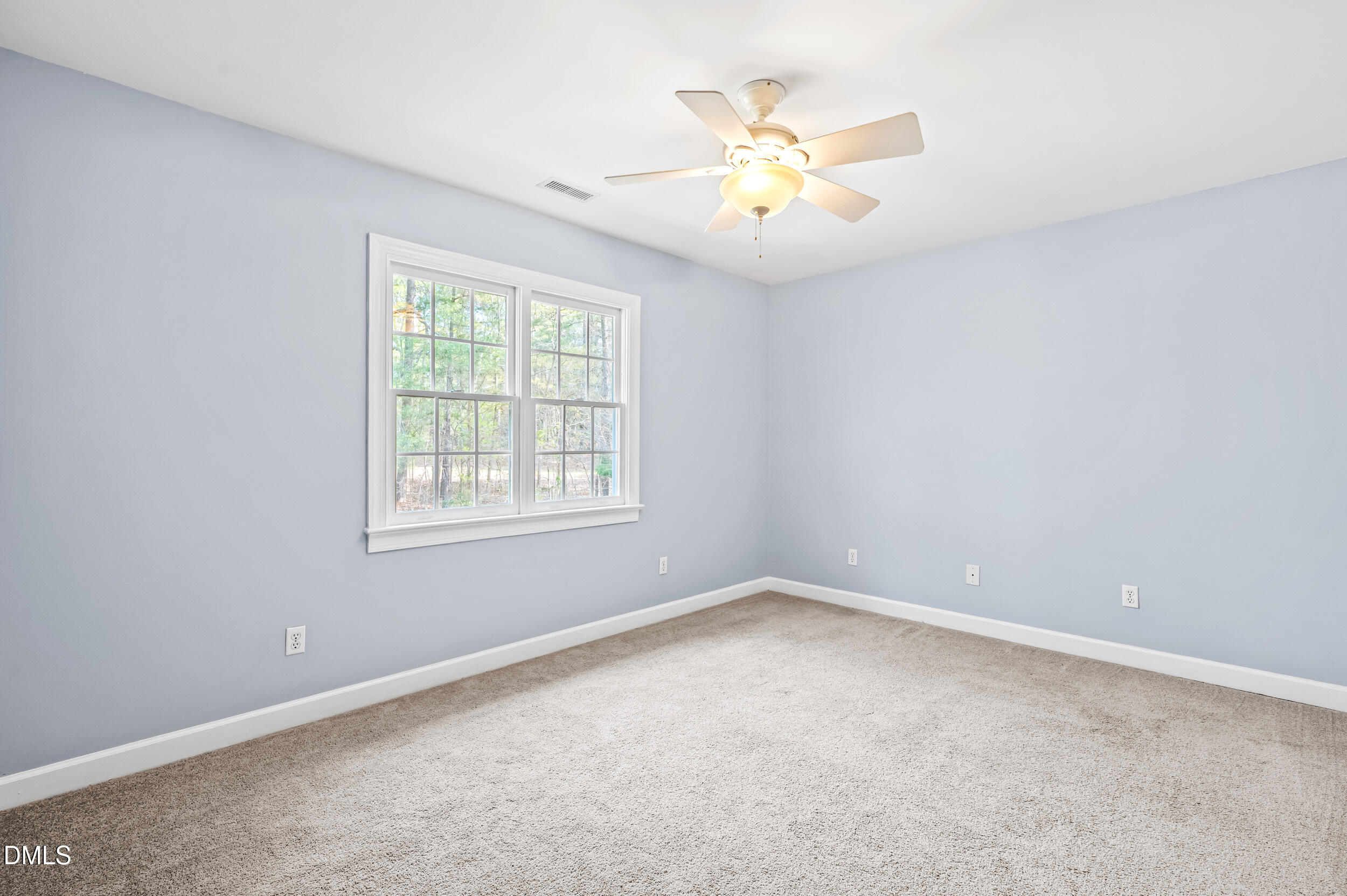1957 Hilltop Road Raleigh, NC 27610 - Photo 23 of 46 an empty room with a window