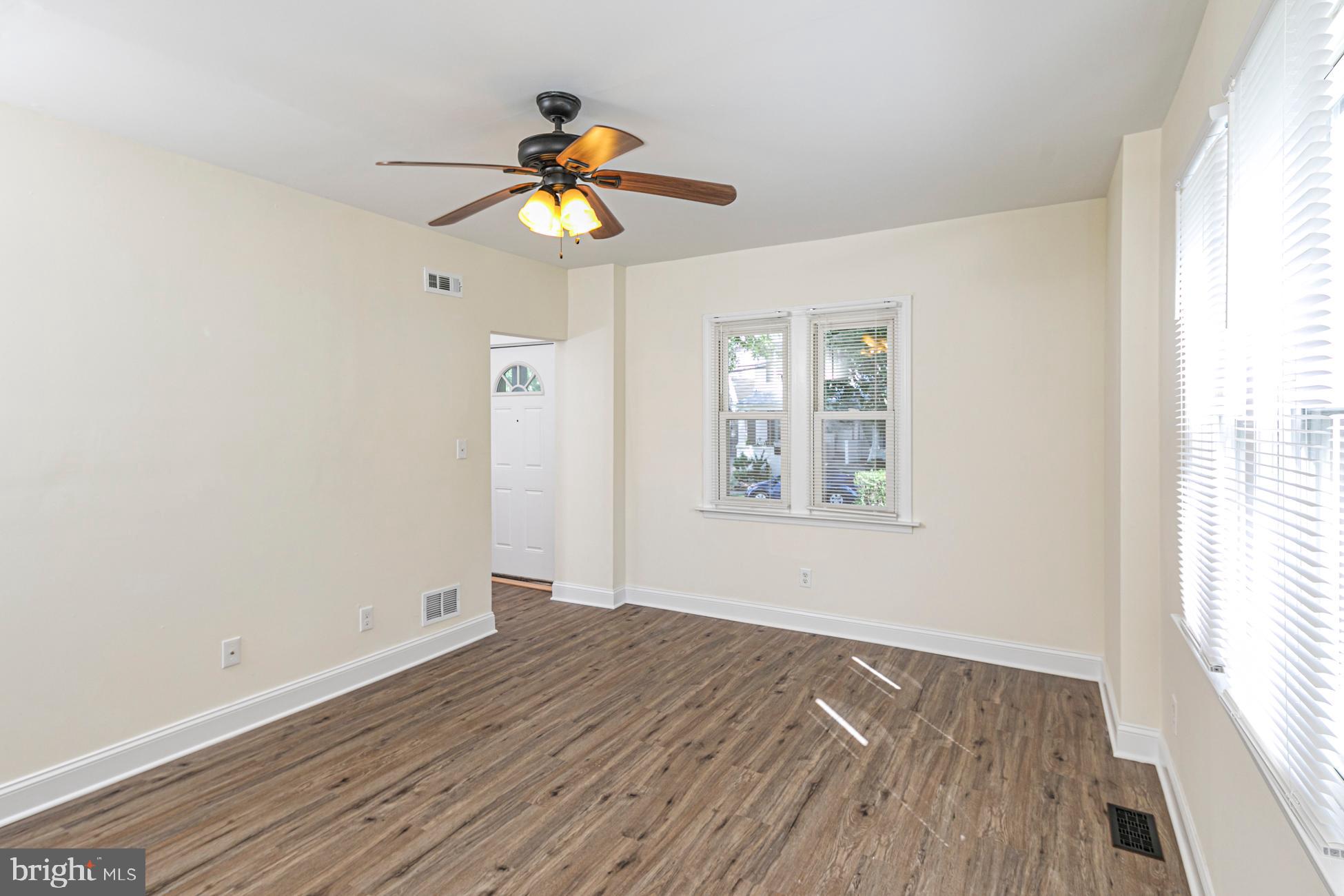 166 John Street Princeton, NJ 08540 - Photo 13 of 29 a view of an empty room with window and wooden floor