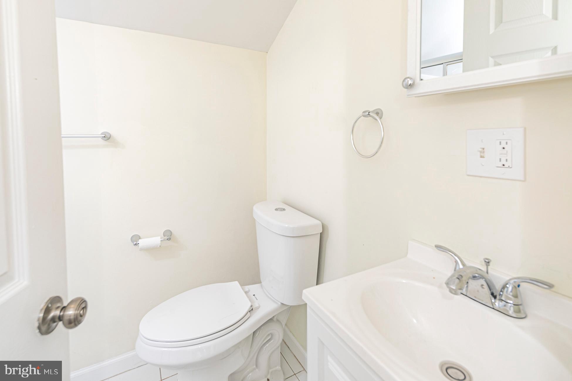 166 John Street Princeton, NJ 08540 - Photo 22 of 29 a white toilet sitting next to a bathroom sink