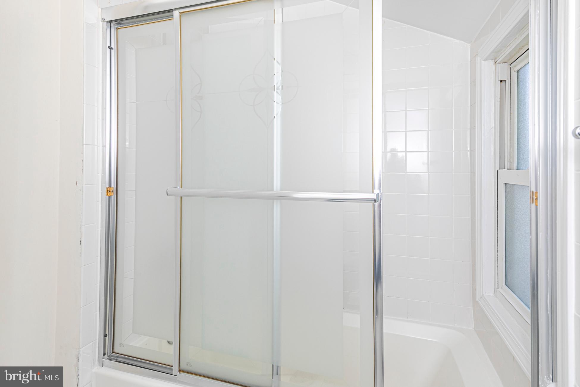 166 John Street Princeton, NJ 08540 - Photo 24 of 29 a bathroom with a glass shower door