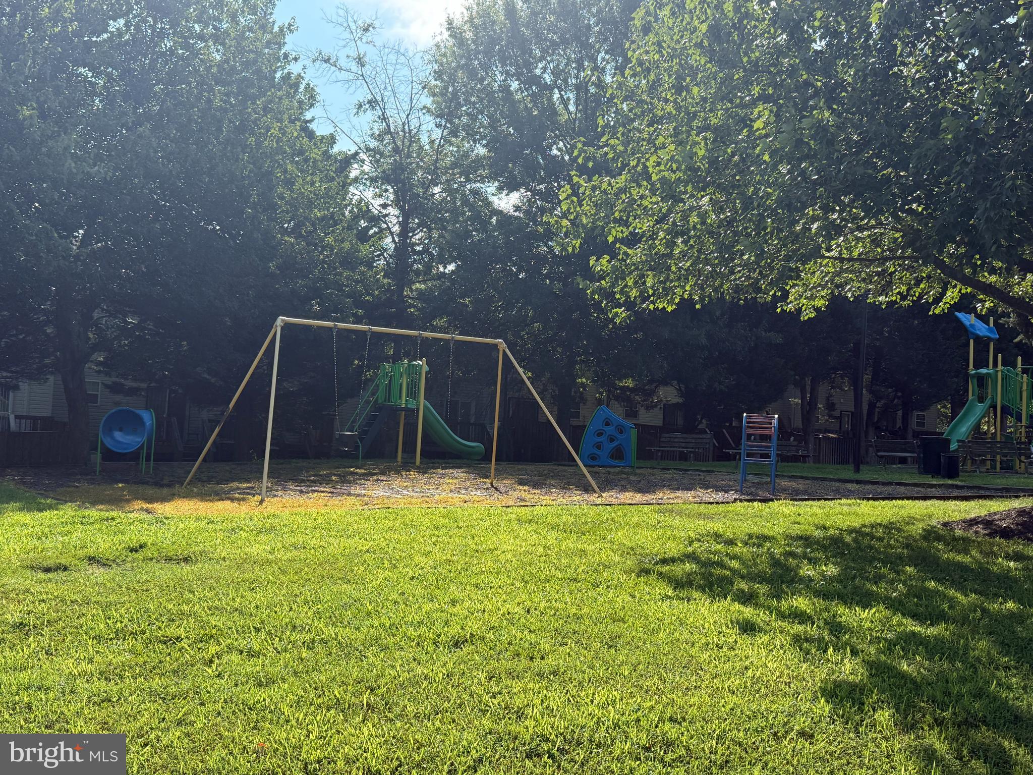 8573 Ritchboro Road District Heights, MD 20747 - Photo 16 of 19 a view of a swimming pool with a patio and a yard