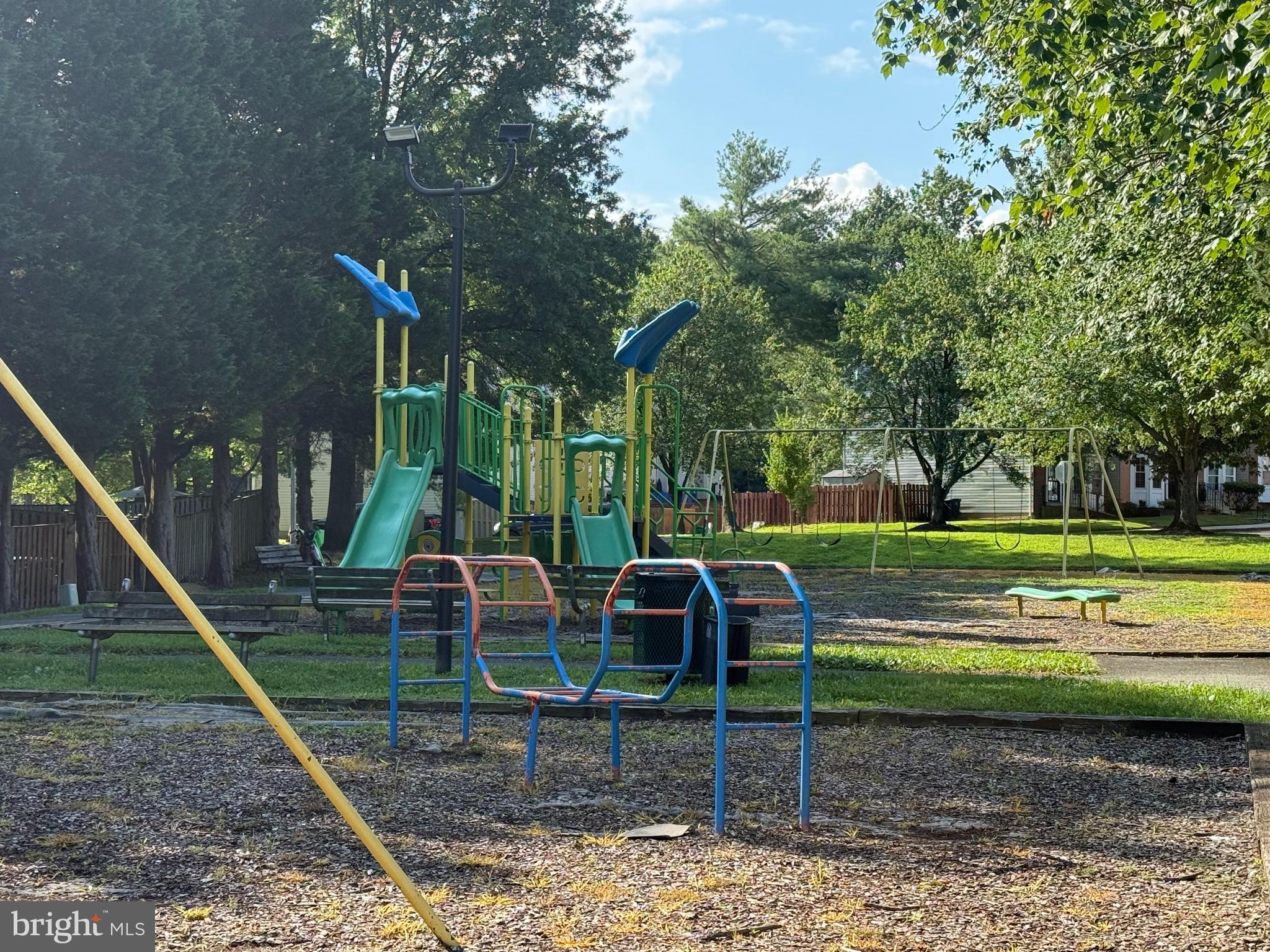 8573 Ritchboro Road District Heights, MD 20747 - Photo 17 of 19 a view of a park with swings