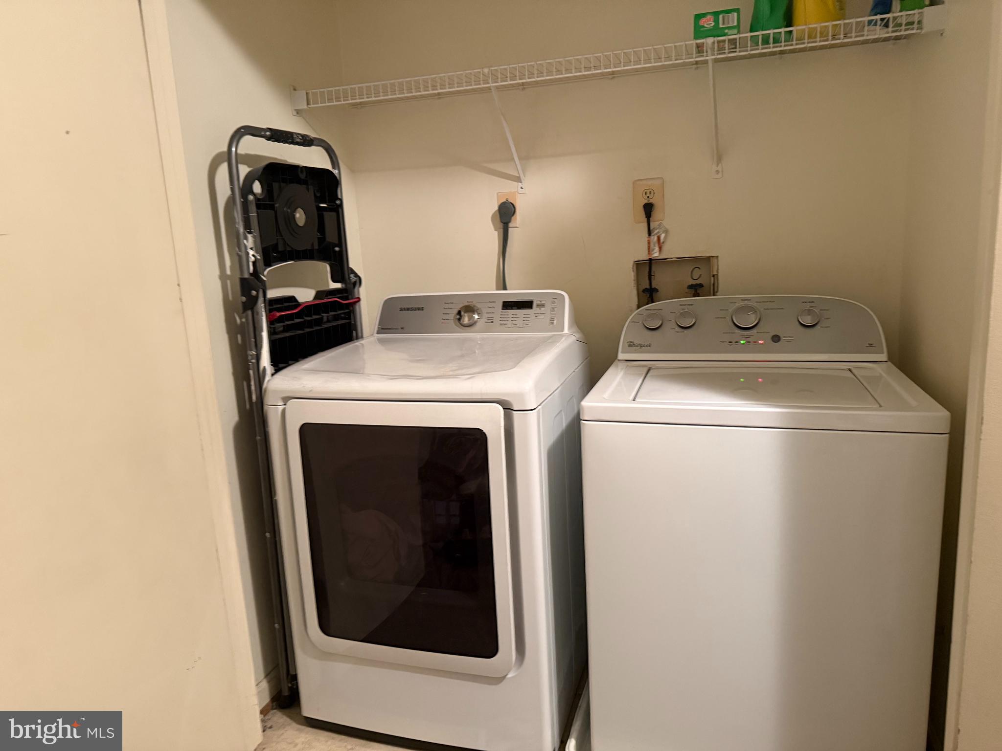 8573 Ritchboro Road District Heights, MD 20747 - Photo 7 of 19 a utility room with dryer and washer