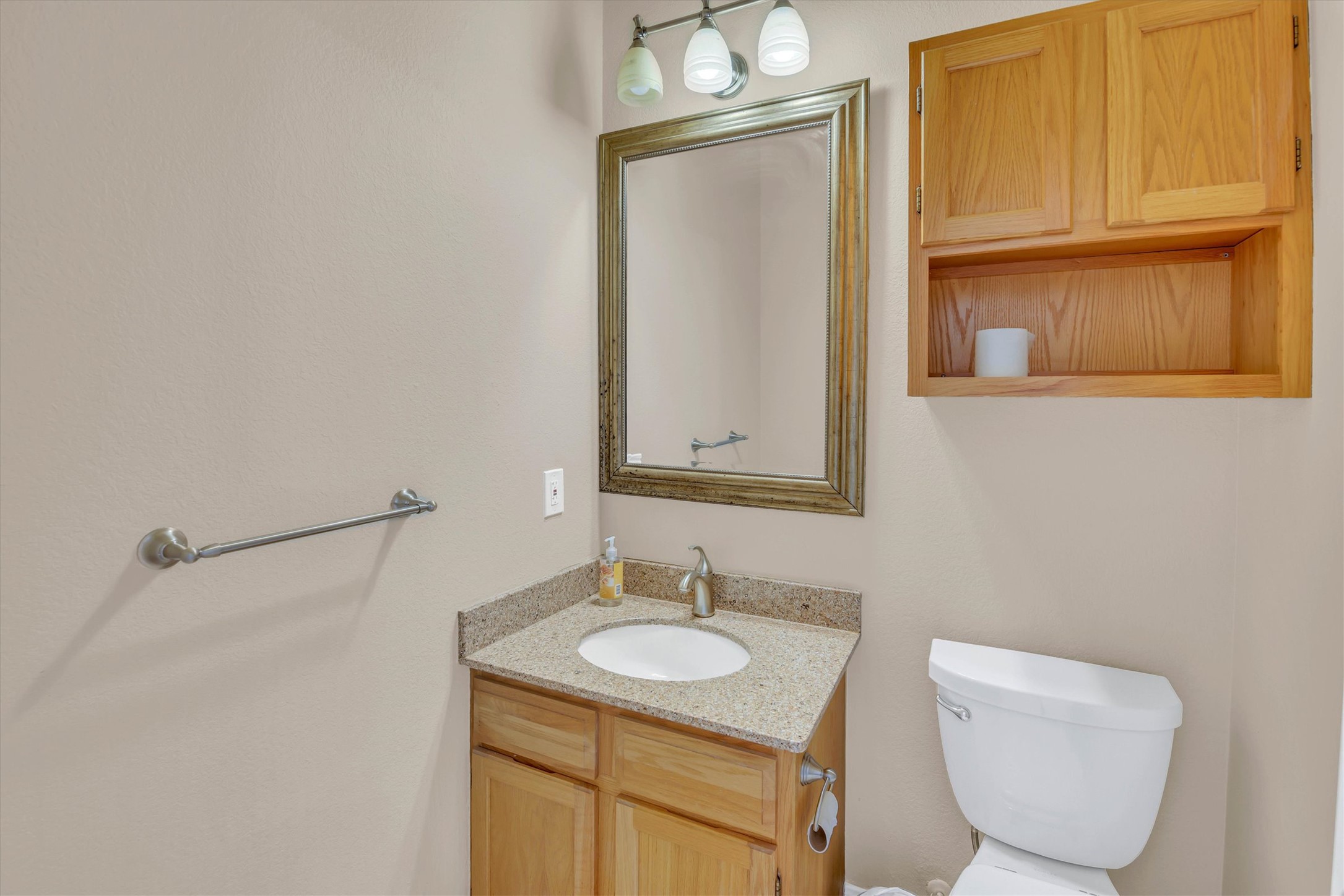 8108 Matchlock Cove Austin, TX 78729 - Photo 35 of 40 Half bath featuring vanity and toilet