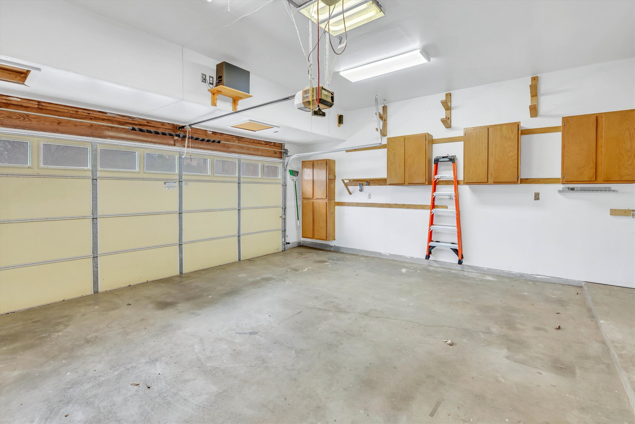 8108 Matchlock Cove Austin, TX 78729 - Photo 38 of 40 Garage with a garage door opener