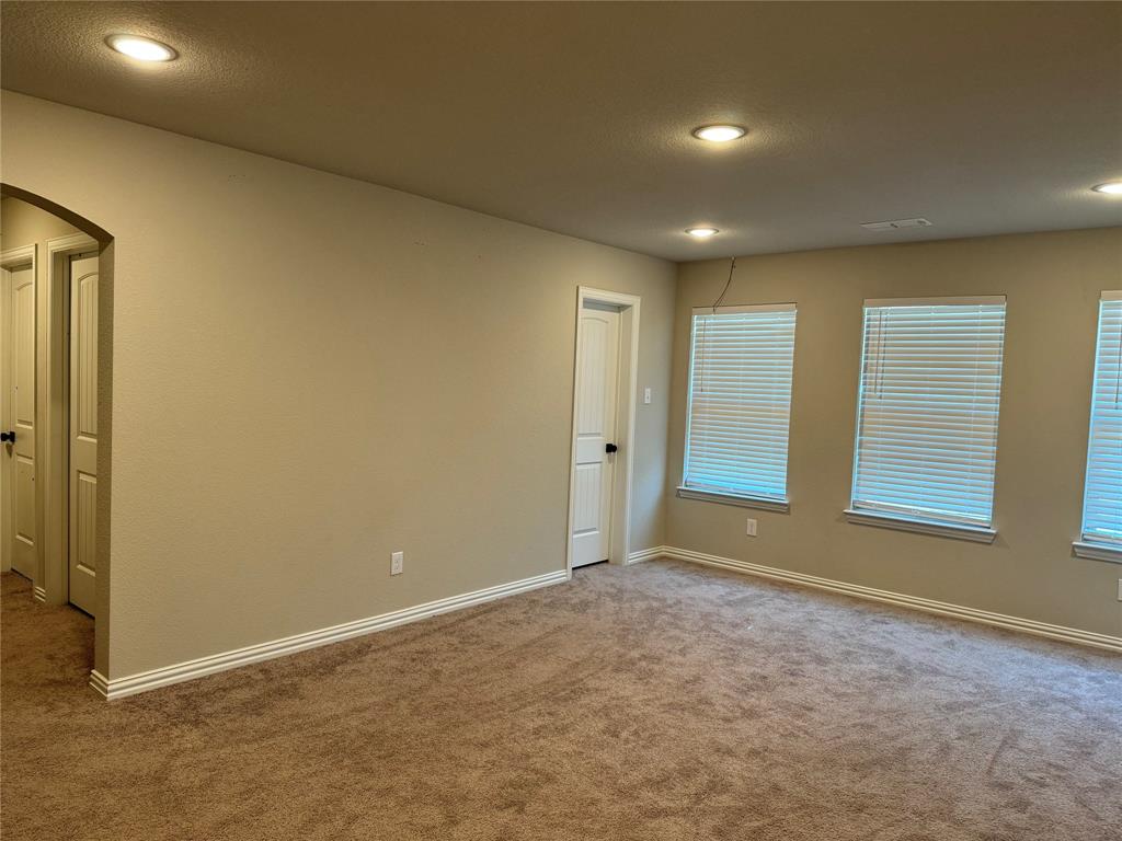 7308 Roaring Springs Road Arlington, TX 76002 - Photo 24 of 29 a view of an empty room with a window