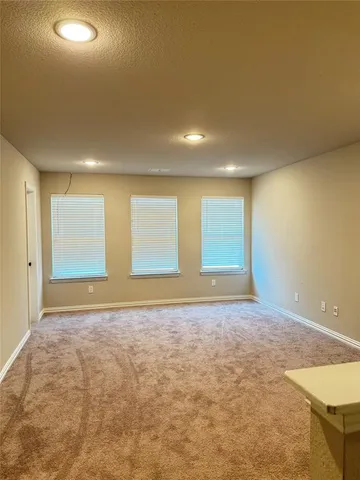 a view of an empty room with window