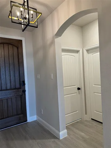 a view of a livingroom with wooden floor