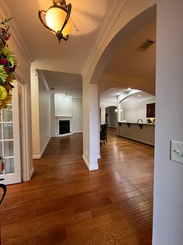 a view of living room with furniture and floor to ceiling window