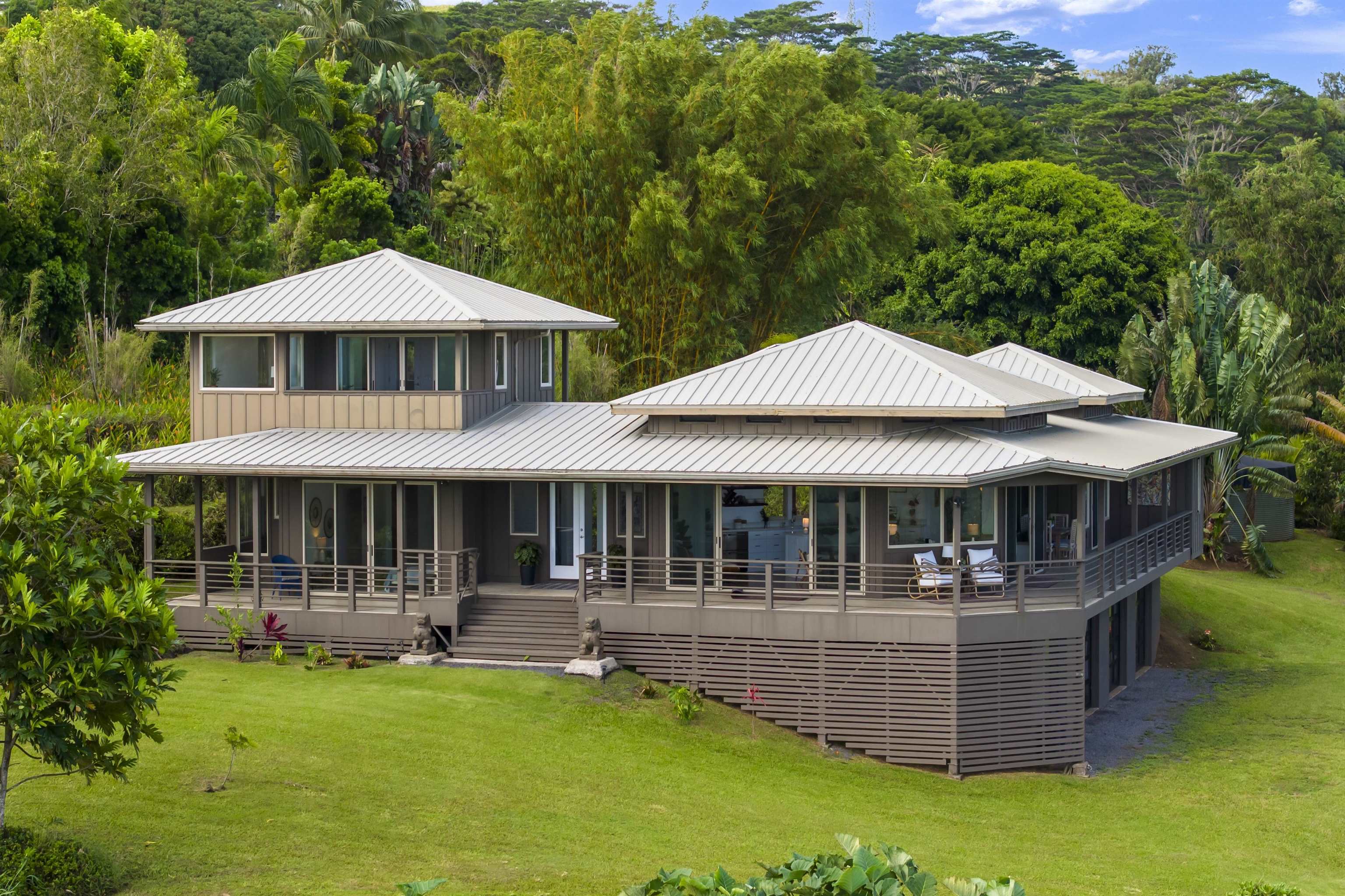 41 Leleaka Place, Unit A Haiku, HI 96708 - Photo 1 of 40 a view of a house with swimming pool and porch with furniture