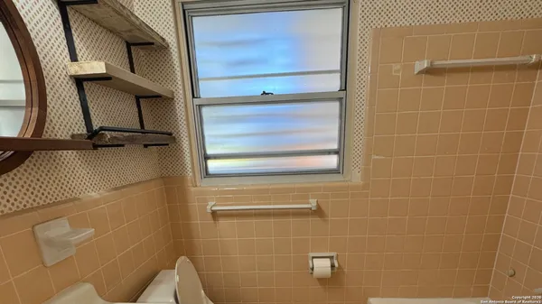 a bathroom with a window