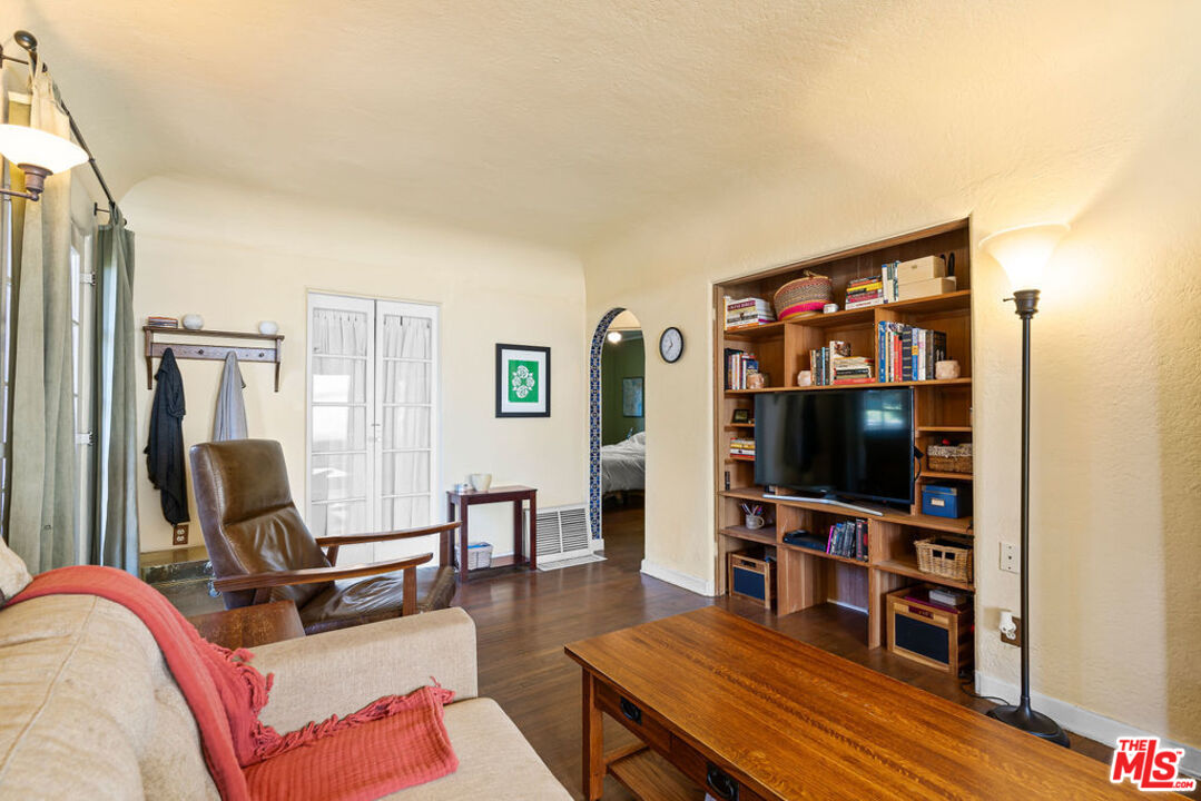 2403 Hyperion Avenue Los Angeles, CA 90027 - Photo 11 of 53 a living room with furniture a flat screen tv and rug floor