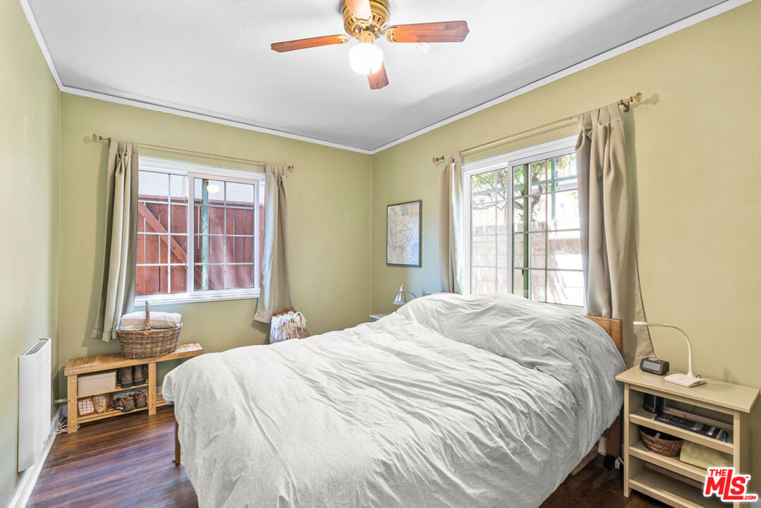 2403 Hyperion Avenue Los Angeles, CA 90027 - Photo 14 of 53 a bedroom with a bed and a window