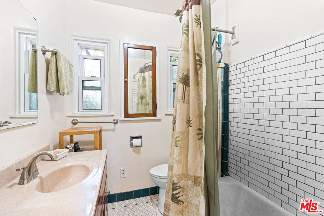 2403 Hyperion Avenue Los Angeles, CA 90027 - Photo 17 of 53 a bathroom with a sink toilet and shower
