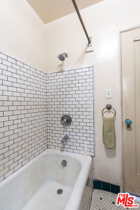 2403 Hyperion Avenue Los Angeles, CA 90027 - Photo 18 of 53 a bathroom with a bathtub and shower