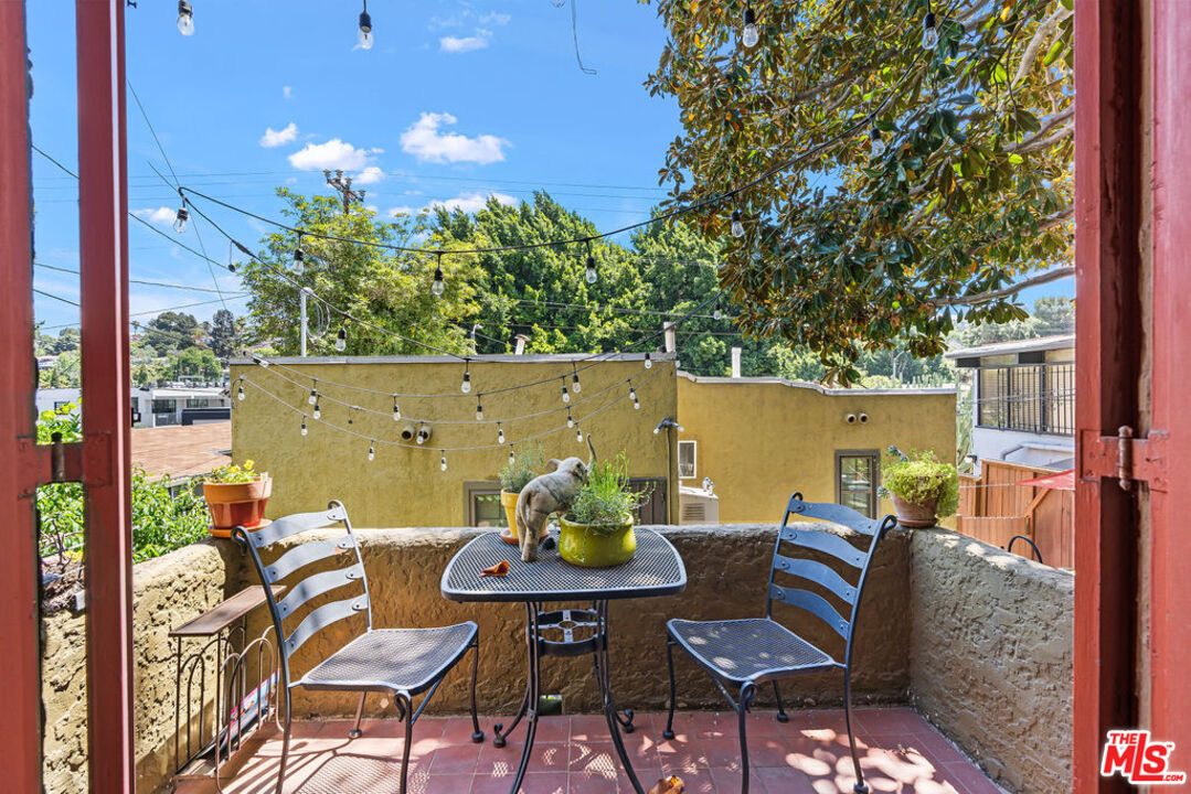 2403 Hyperion Avenue Los Angeles, CA 90027 - Photo 20 of 53 a view of a chairs and table in patio